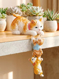 SENSE RIOT | 🐾 "The Lifeline" Hanging Cat Trio – Hand-Painted Resin Zen Decor & Stress-Relief Accent
